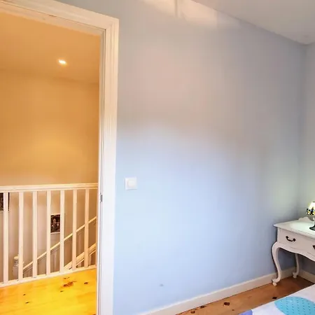 בית אירוח Casa Vacacional La Coruxa